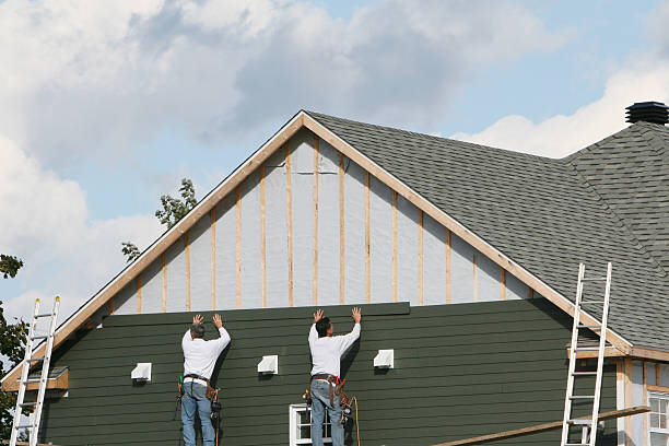 Professional Siding Installation technician working in Quarryville, PA